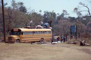 Bus with people and goods on top (1282.42 Kb)