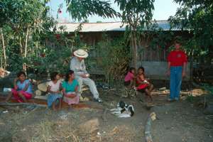 Family sitting outside their house (1514.22 Kb)